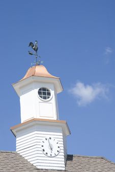 Clock And Weathervane Stock Image