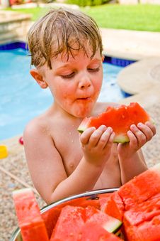Young Boy Enjoying Watermelon. Royalty Free Stock Image