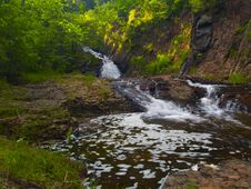 Falls, Water, And Stone On A Summer Evening Royalty Free Stock Photos