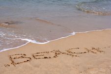 The Word BEACH Written In Sand Stock Photography The Word BEACH Written In Sand Stock Photography