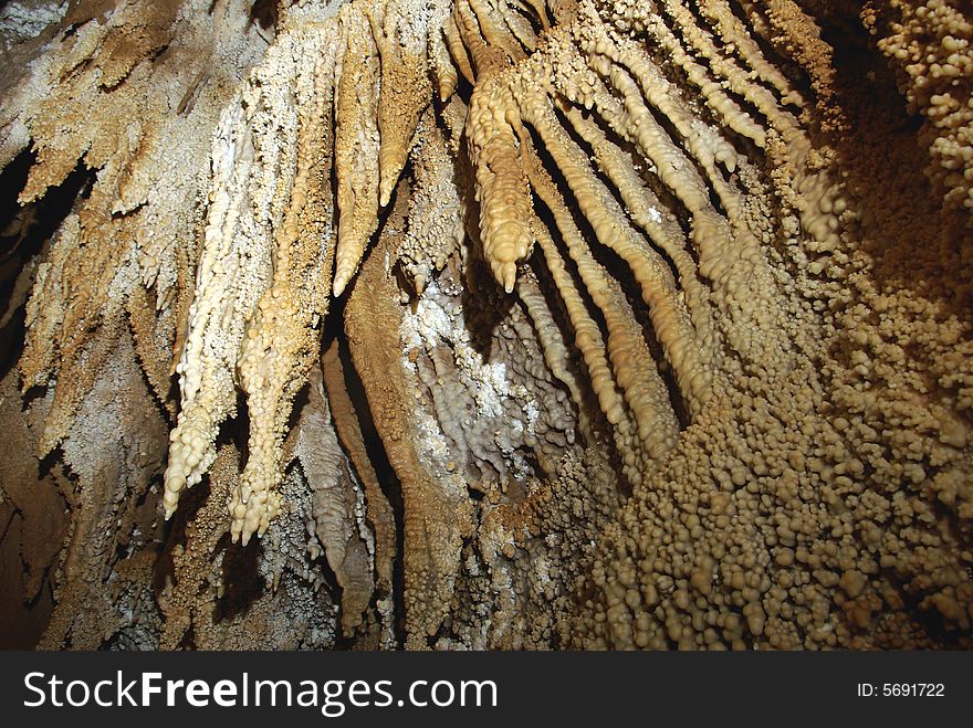 Stalactites on a wild cave.