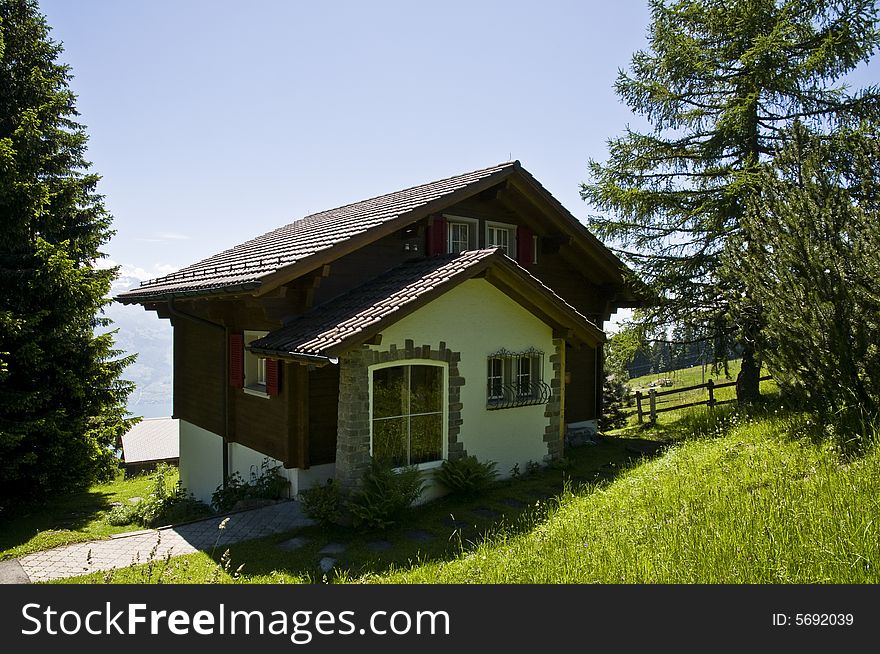 Rural wooden and stony house in the swiss mountains. Rural wooden and stony house in the swiss mountains