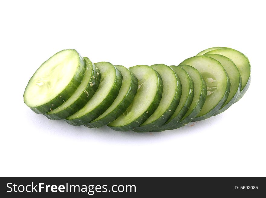 Fresh green cucumber on the white background