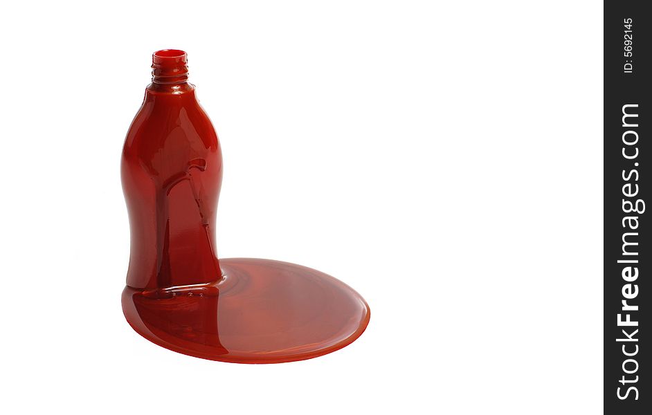 Red plastic bottle with gel and the poured gel. Red plastic bottle with gel and the poured gel