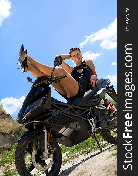 Pretty Model With Black Motorcycle