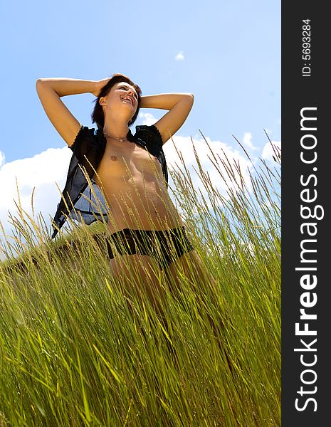 Young Naked Woman On Green Meadow