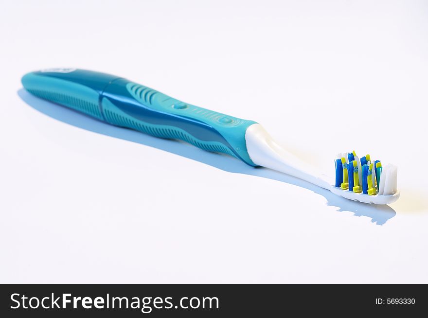 Electric toothbrush isolated on the white background