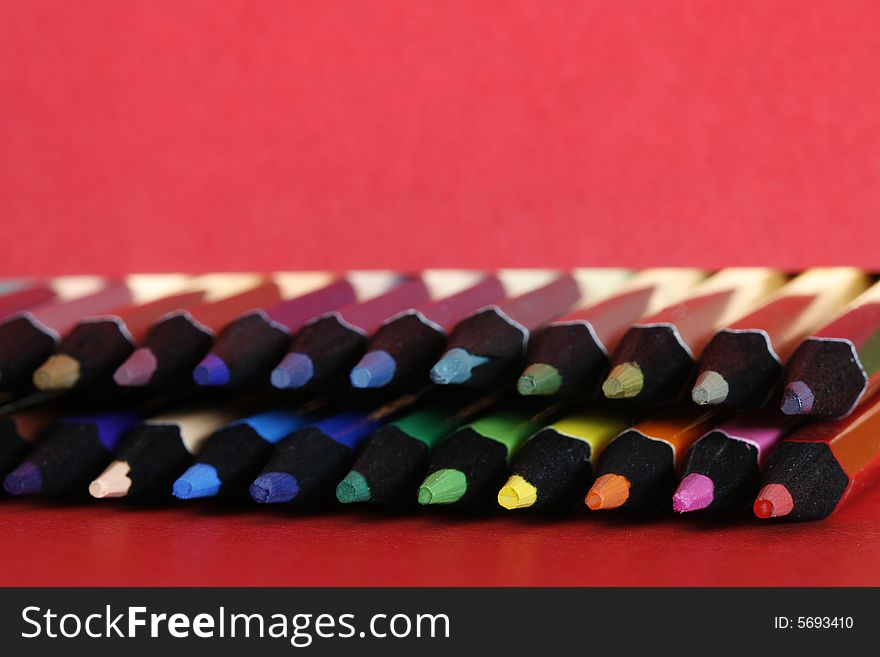 Colors pencils in a simple blackcolor background. Colors pencils in a simple blackcolor background
