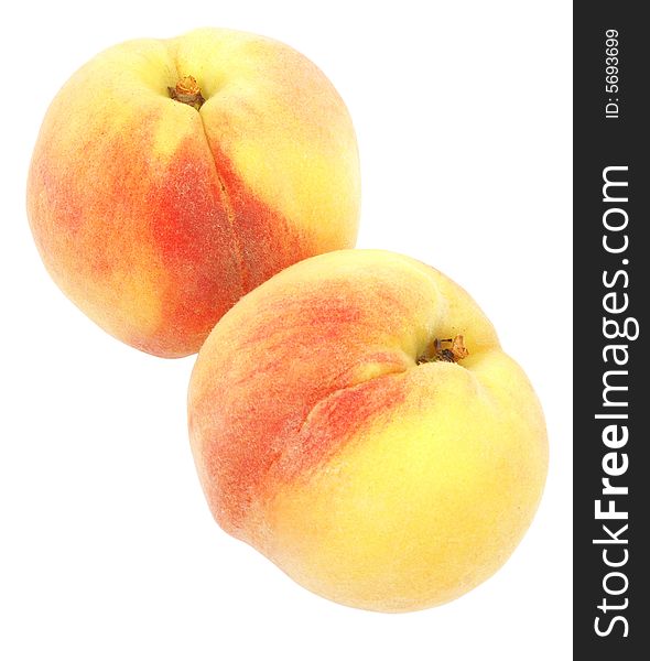 Nice fresh peaches isolated over white with clipping path
