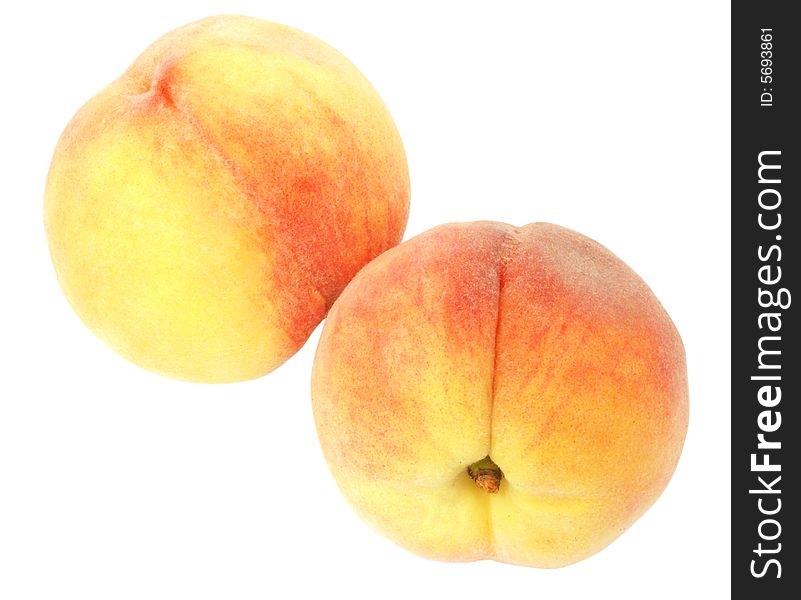 Nice fresh peaches isolated over white with clipping path