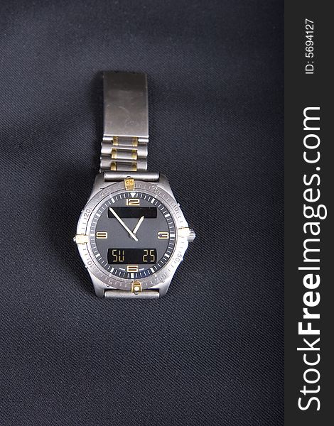 A nice swiss digital watch on a black background