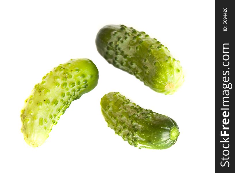 Group of three cucumbers isolated on white background. Group of three cucumbers isolated on white background