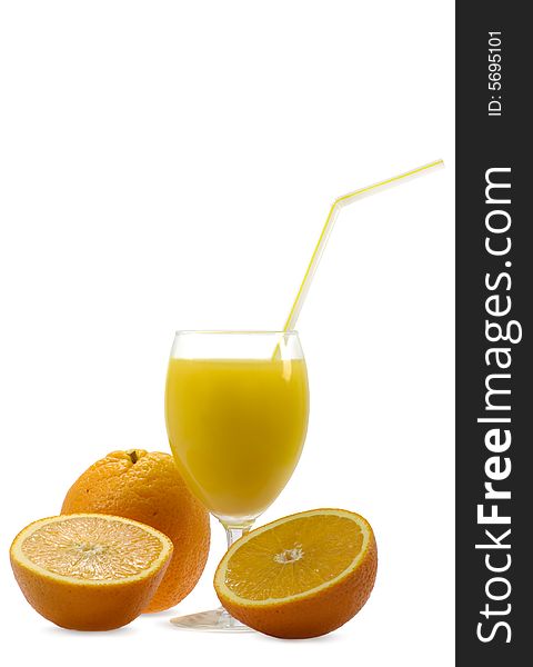 Glass of fresh juice and oranges on a white background. Glass of fresh juice and oranges on a white background