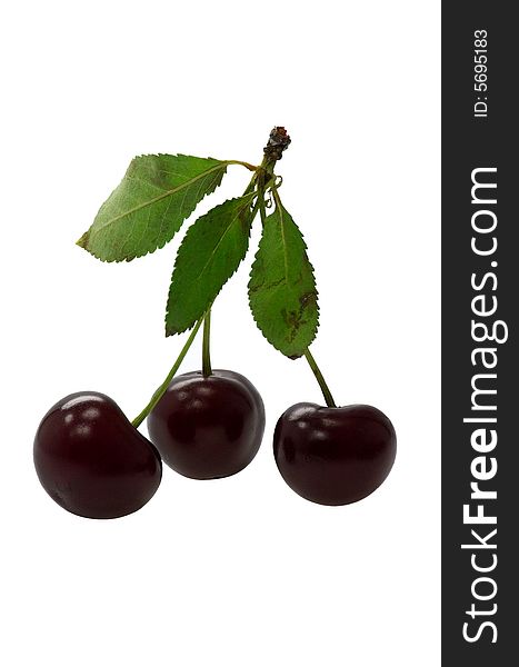 Ripe fruits of a cherry on a white background