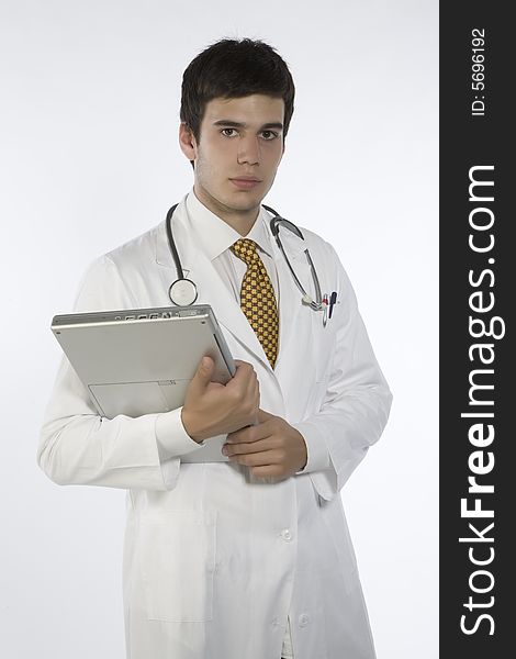 Young doctor with overall,stethoscope and portable