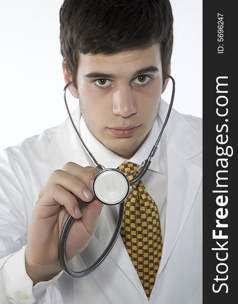 Young doctor with overall and stethoscope