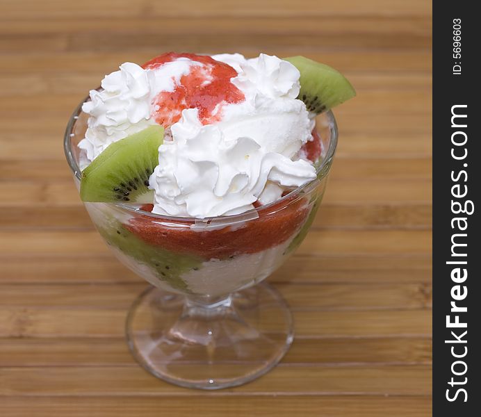 Sweet Dessert with strawberry kiwi and cream