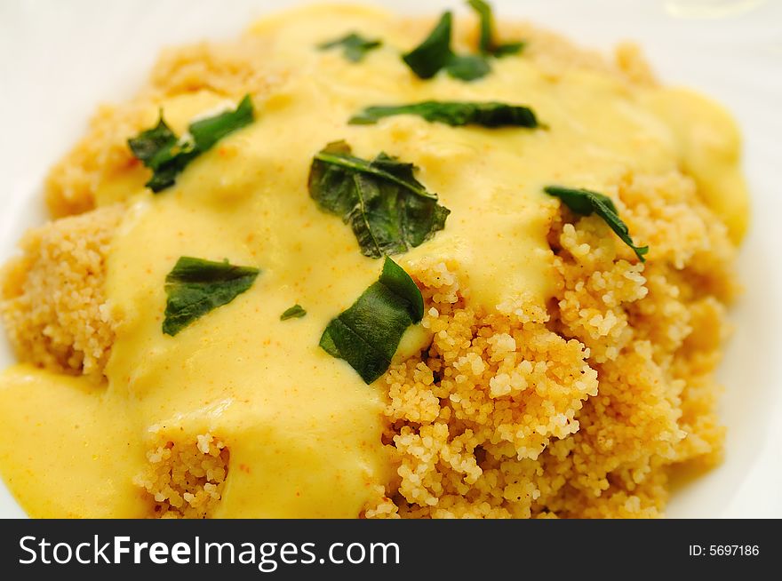 Cous Cous With Curry Sauce And Basil