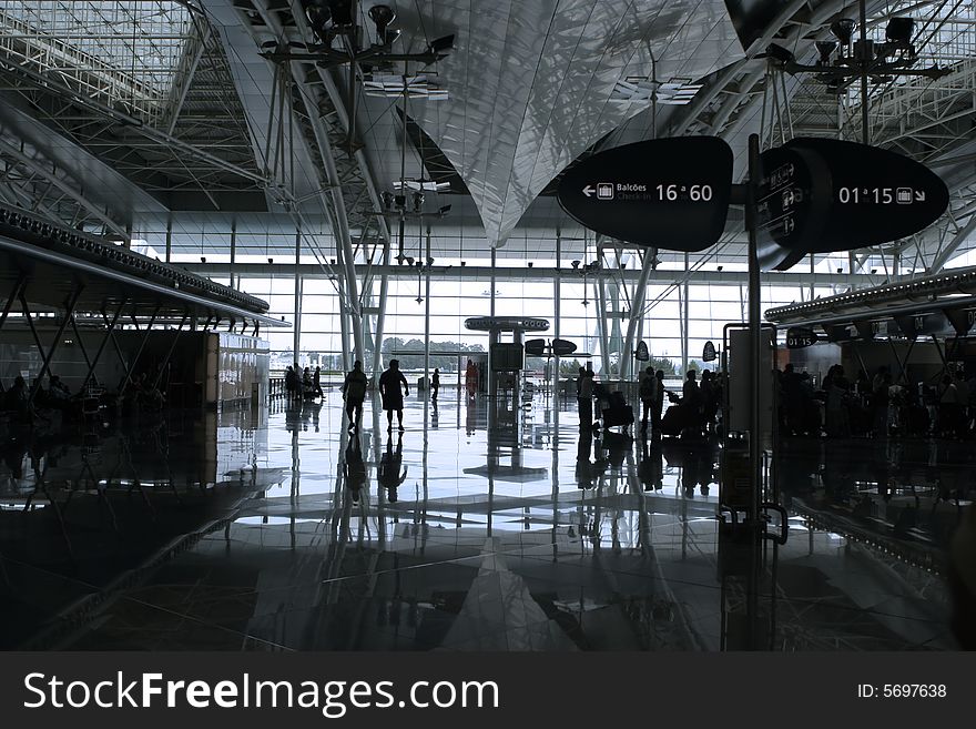 People waiting in the airport. People waiting in the airport