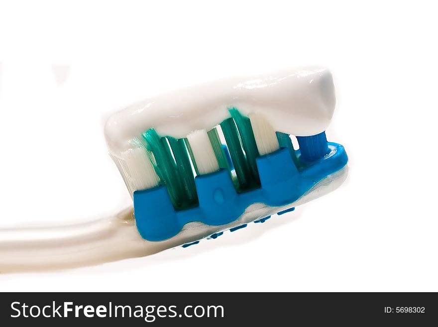 Macro tooth brush with tooth paste
