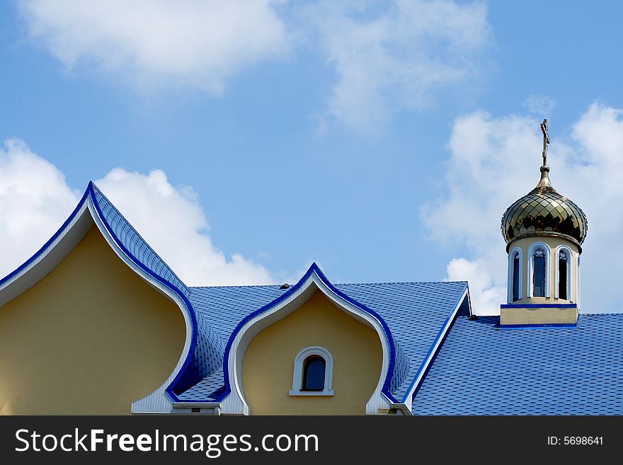 Blue roof of church against the sky background. Blue roof of church against the sky background