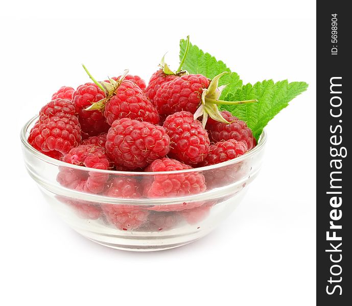 Red Raspberry Fruits In Glass Vase