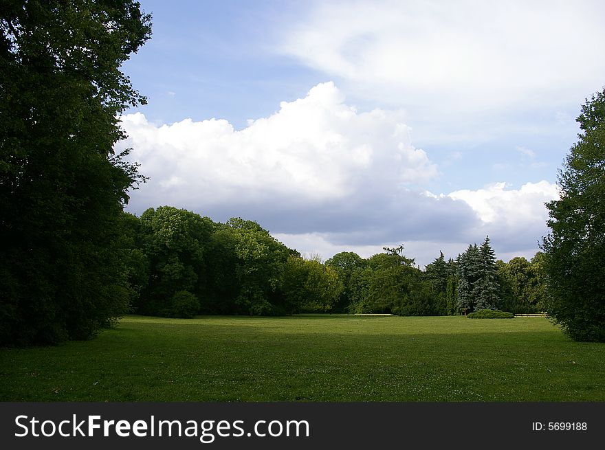 View over green park meadow brings optimistic feeling. View over green park meadow brings optimistic feeling