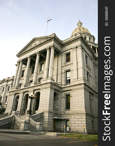 American and Colorado flags on Capitol State building, Denver, Colorado, USA