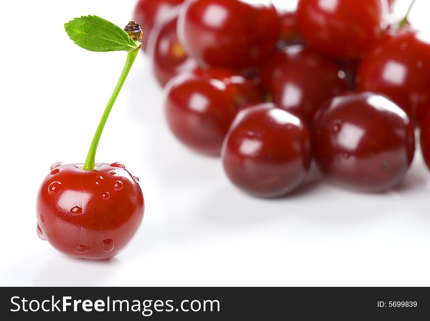 Bouquet of ripe cherries, green leaf. Bouquet of ripe cherries, green leaf