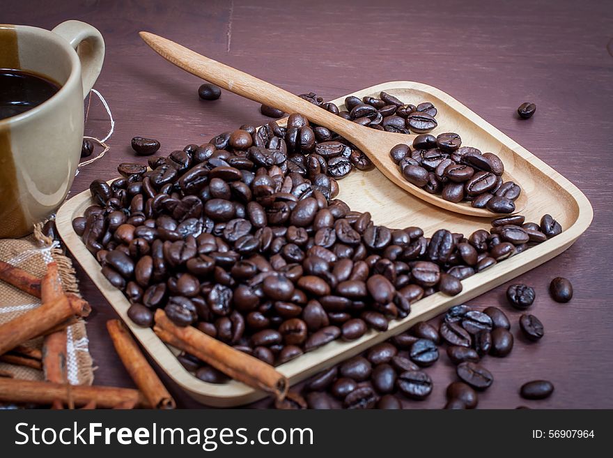 Coffee on grunge wooden background.