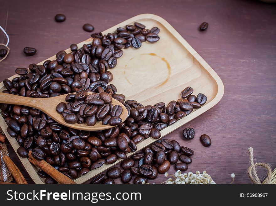 Coffee on grunge wooden background.