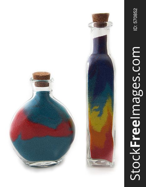 Two bottles with colorful sand