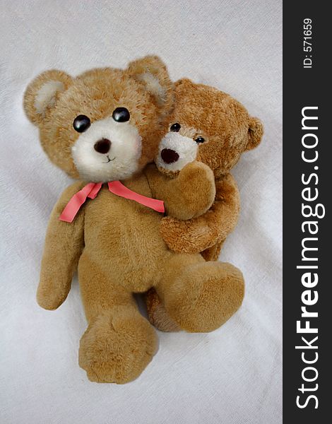 Two loving teddy bears for use in valentine, marriage, anniversary, partnership, courtship, love, romantic, or friendship scenario. Two loving teddy bears for use in valentine, marriage, anniversary, partnership, courtship, love, romantic, or friendship scenario