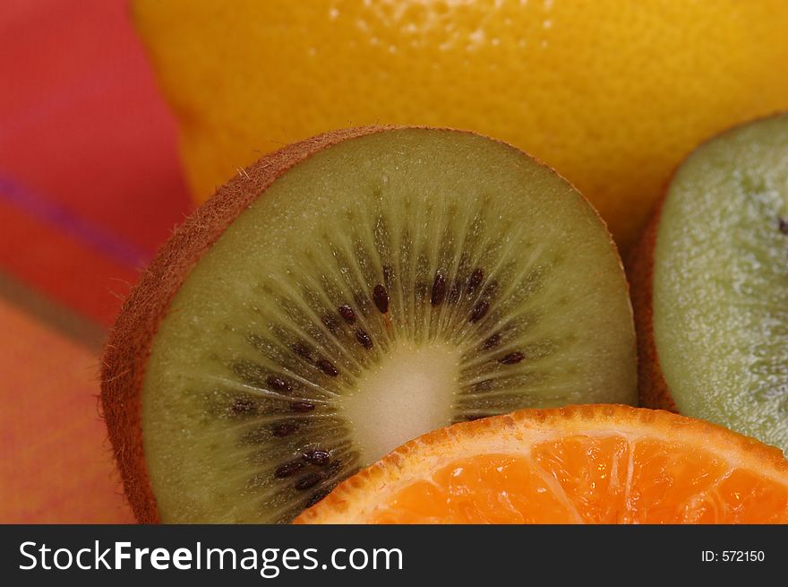 Half of citrus fruit:kiwi,orange and lemon