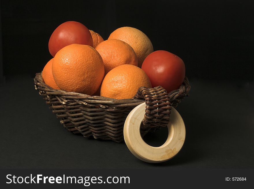Fruit basket over black
