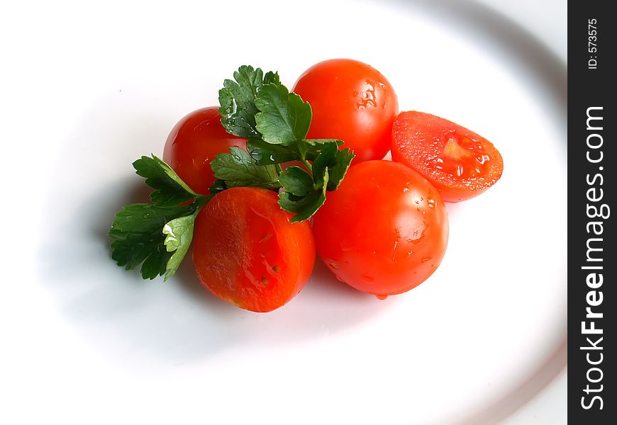 Tomatos on a plate. Tomatos on a plate