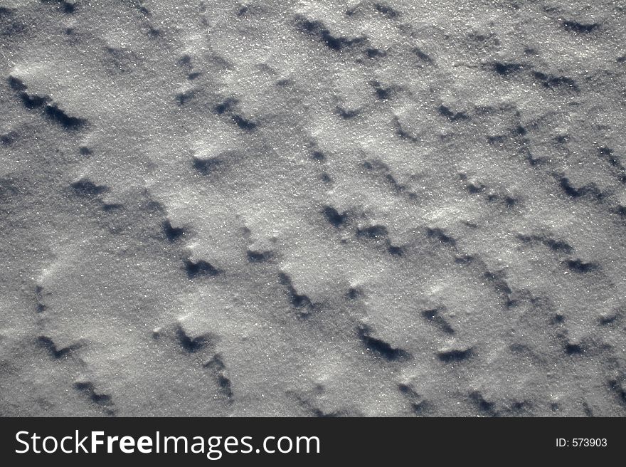 Fragment of a snow-covered surface. Fragment of a snow-covered surface