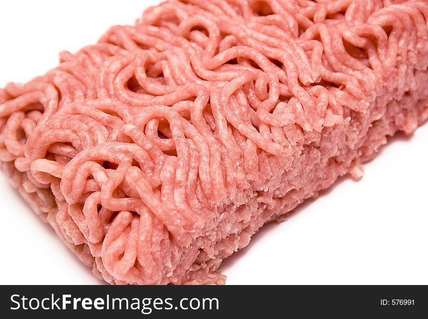 Close-up on a piece of minced meat. Close-up on a piece of minced meat.