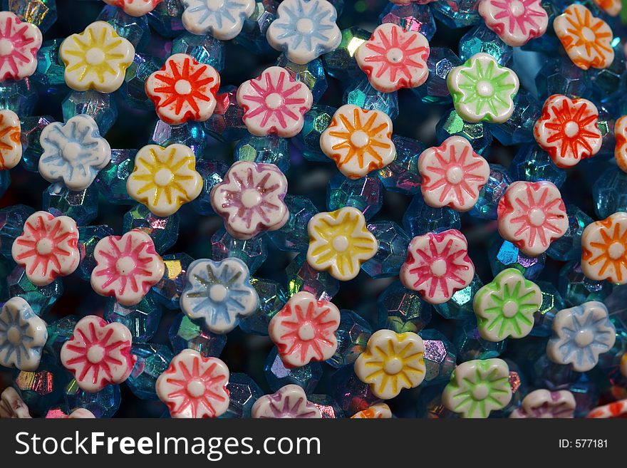 Decorative fake plastic miniature flowers. Decorative fake plastic miniature flowers