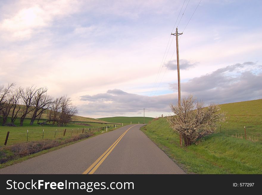 Country road on a cloudy spring afternoon