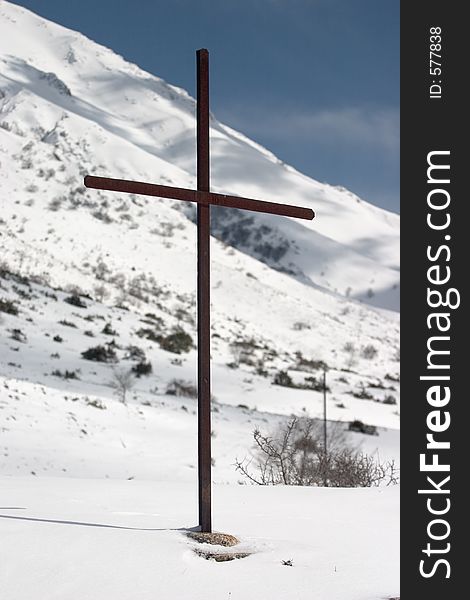 Latin cross on snow