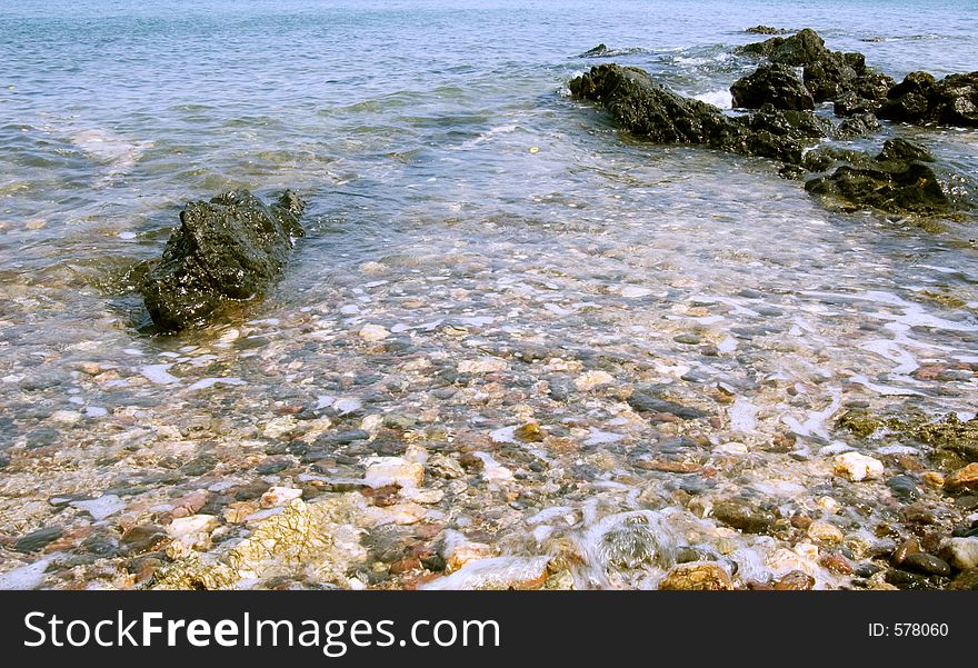 Beach with rocks underwater Location: Pataya, Thailand