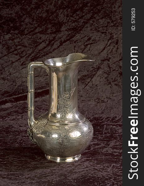A silver ewer used for the water in a Baptism
