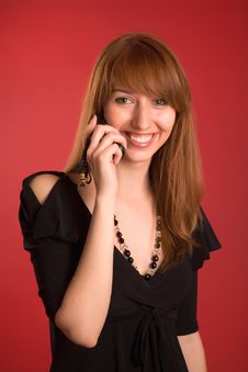 Smiling Girl In Evening Dress With Mobile Phone Royalty Free Stock Photos Smiling Girl In Evening Dress With Mobile Phone Royalty Free Stock Photos