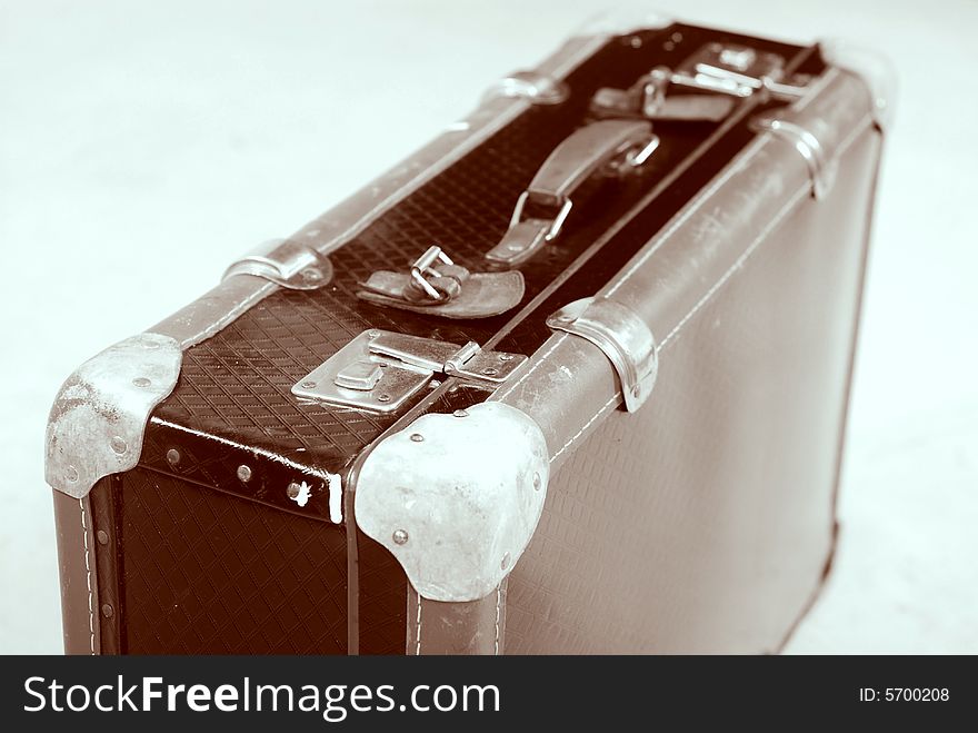 Old isolated retro styled suitcase at white background. Old isolated retro styled suitcase at white background