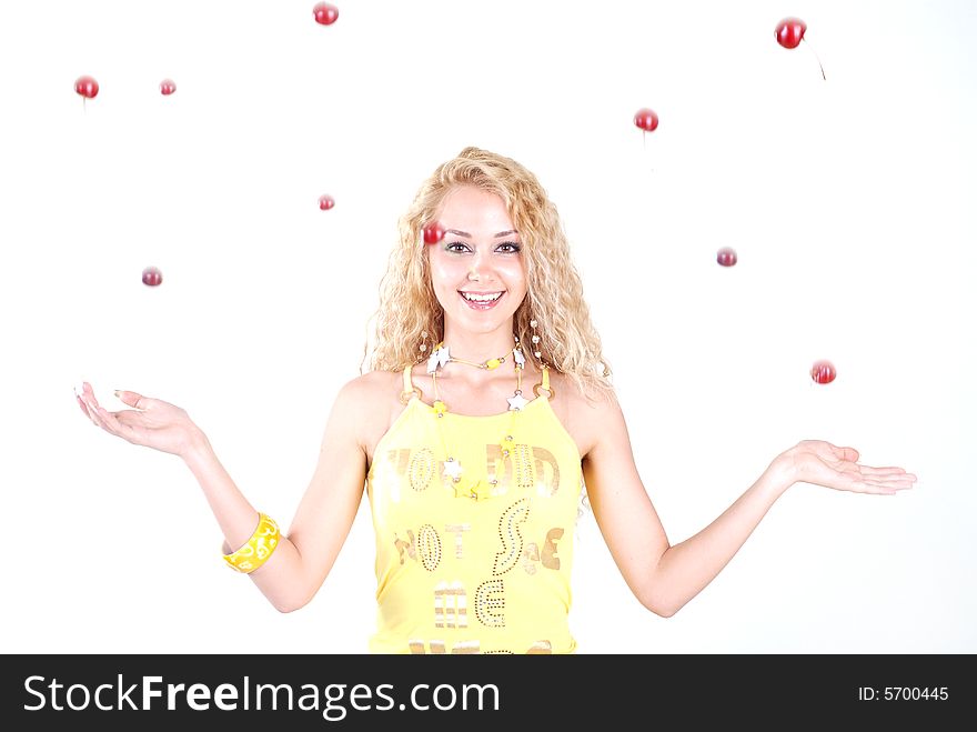 Falling cherry and happy woman at white background