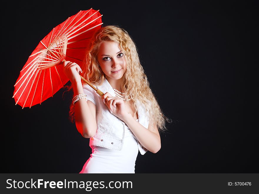 Portrait of young beauty woman in white dress at black background with umbrella. Portrait of young beauty woman in white dress at black background with umbrella