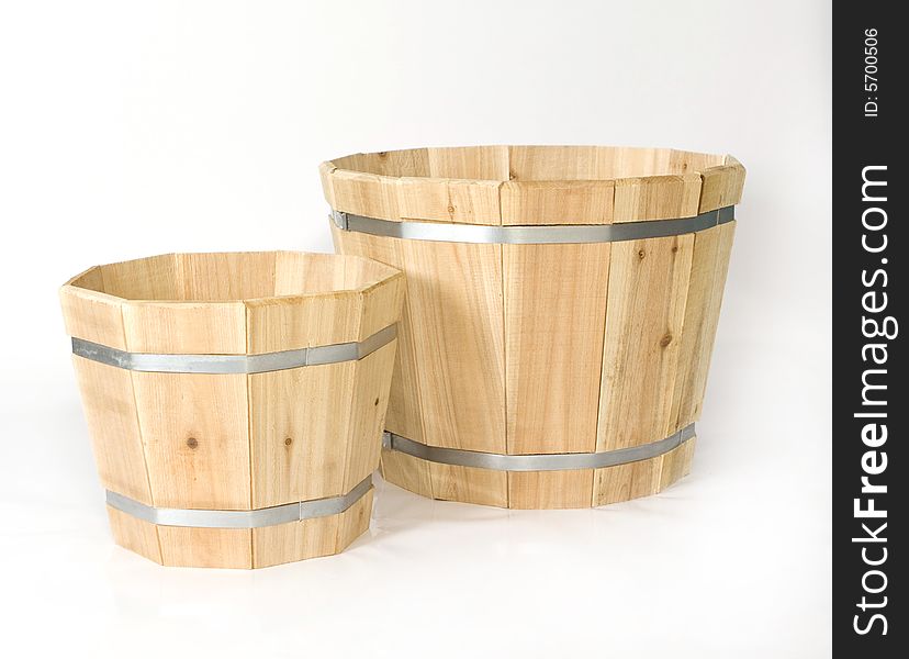 Two cedar planters of different size.