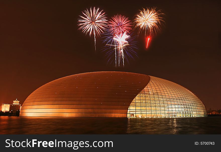 The newly opened Beijing National Theater Complex ï¿½ with a firework illustration. The newly opened Beijing National Theater Complex ï¿½ with a firework illustration