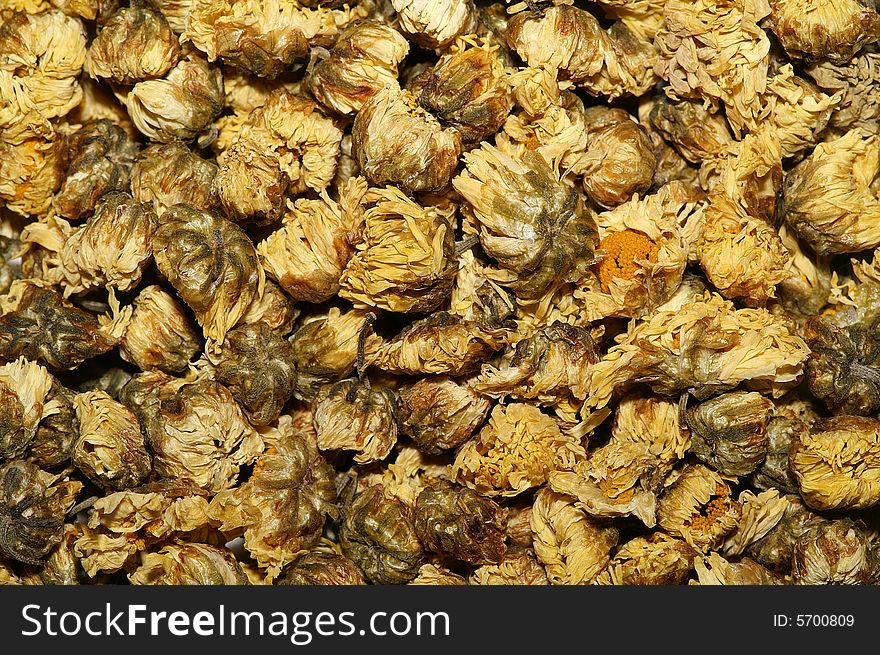 Chinese traditional medicine, dry chrysanthemum flower, macro 1:2